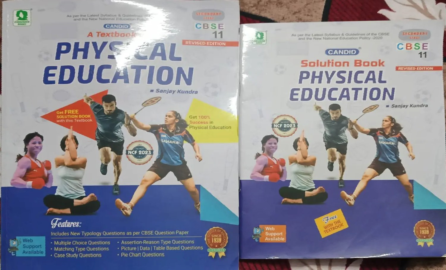 Physical education book + solution book for class 11 by Sanjay kundra